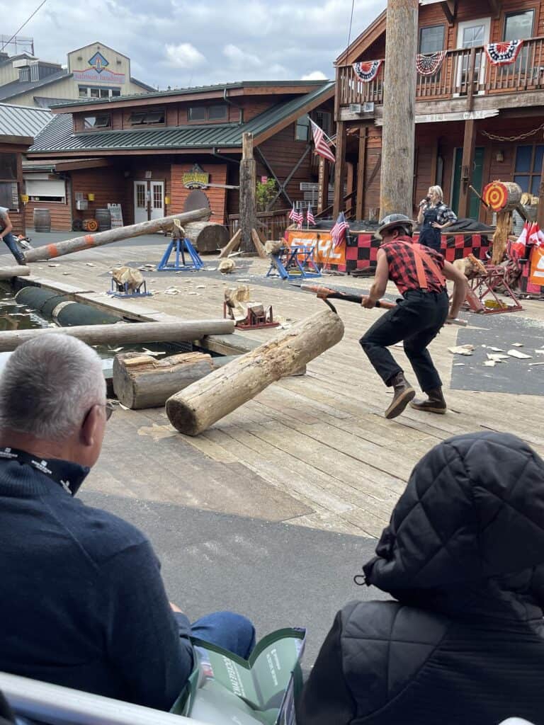 lumberjack show in Ketchikan, Alaska for the post Is an Alaska Cruise Worth It? What Travelers Should Know Before Booking