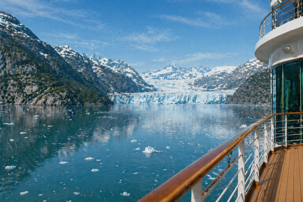Glacier and snow-capped mountains seen from an Alaska cruise ship balcony