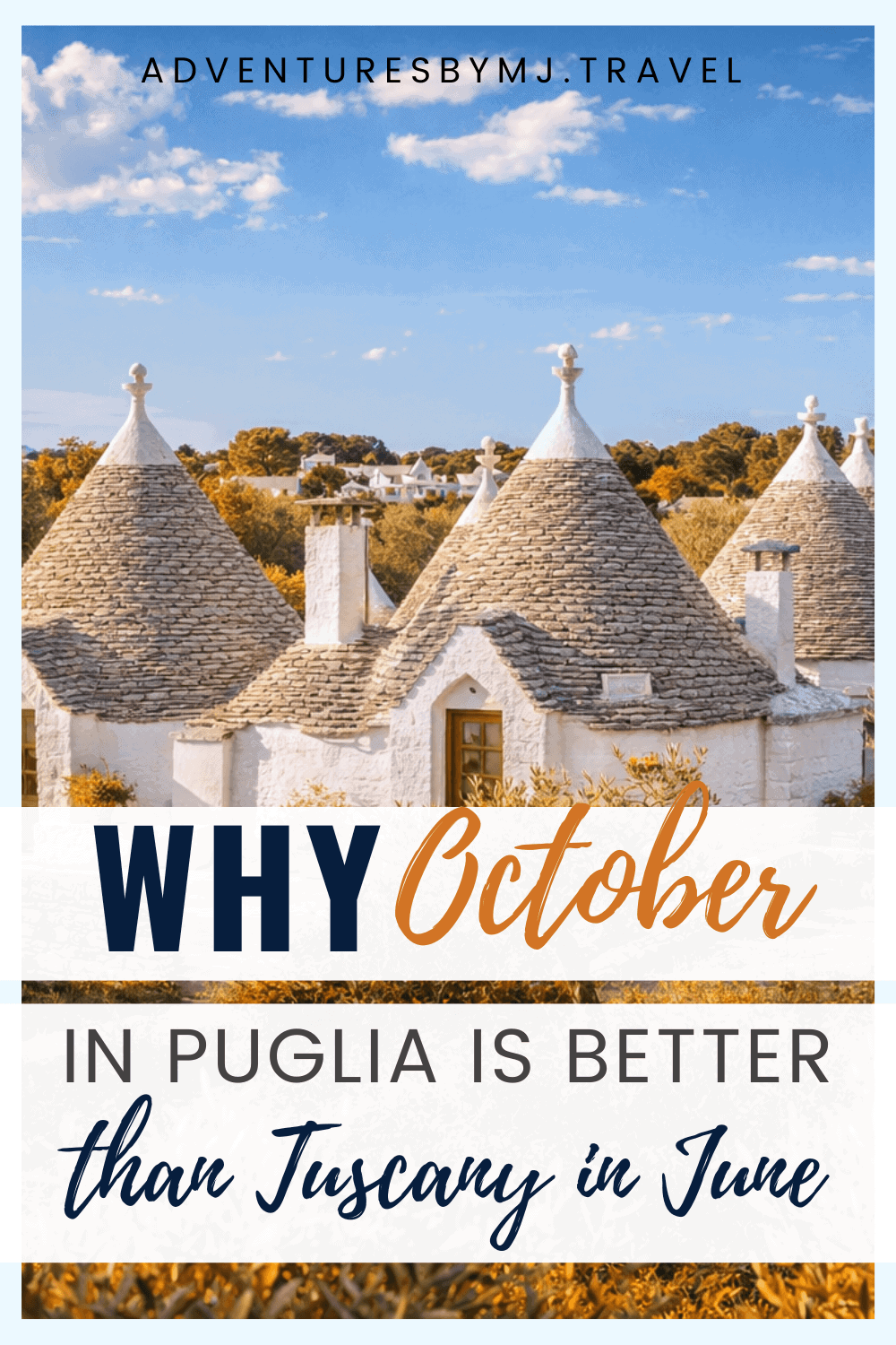 Whitewashed trulli houses in Alberobello, Puglia surrounded by autumn olive groves under blue sky, promoting why October travel in Puglia is better than Tuscany in June