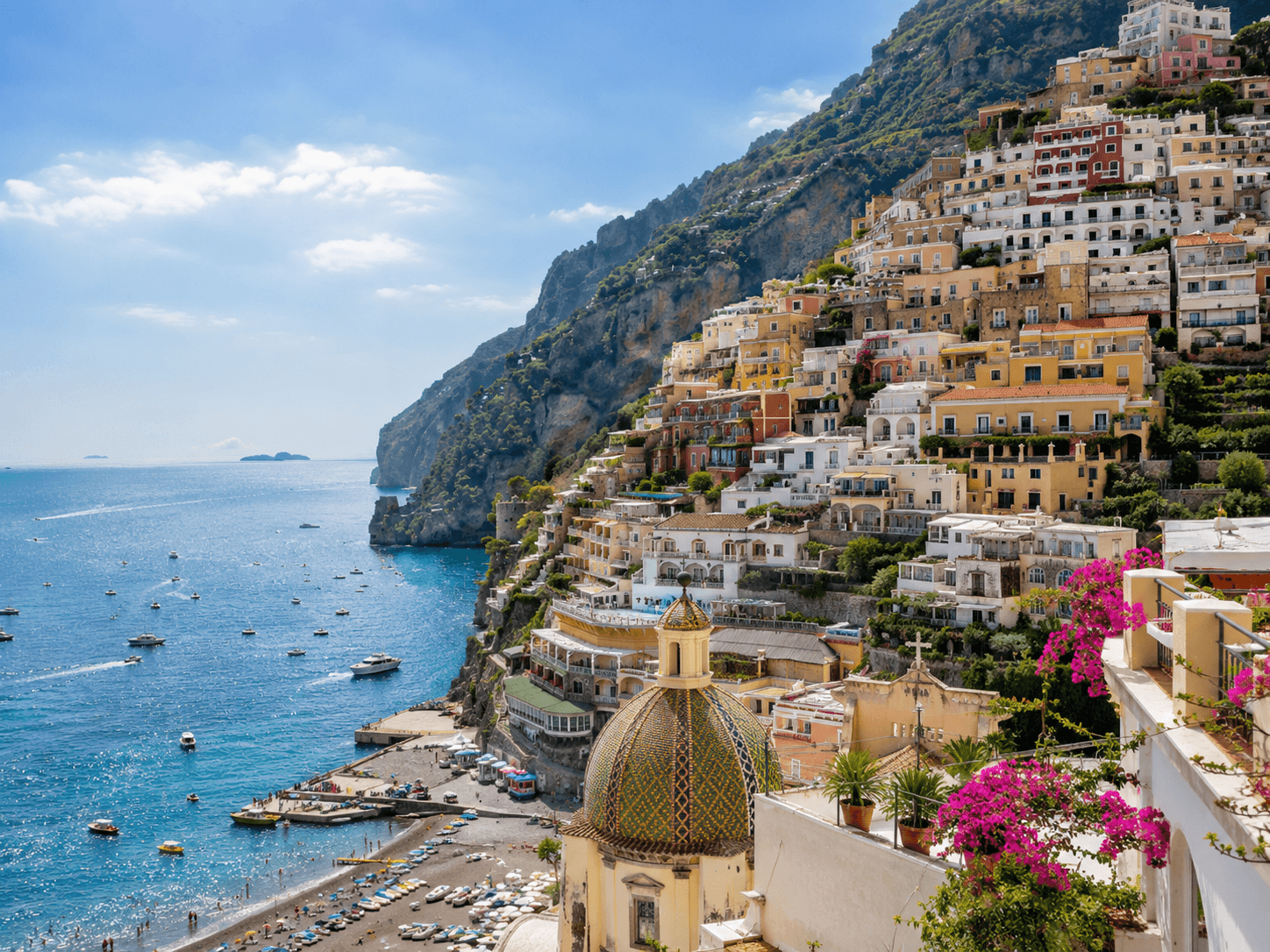 Aerial view of Positano on the Amalfi Coast, colorful cliffside buildings above the Tyrrhenian Sea