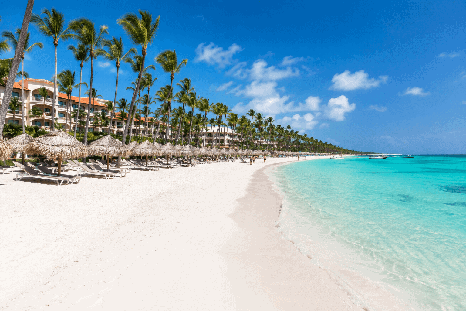 Wide white sand at Bávaro Beach lined with Punta Cana all-inclusive resorts