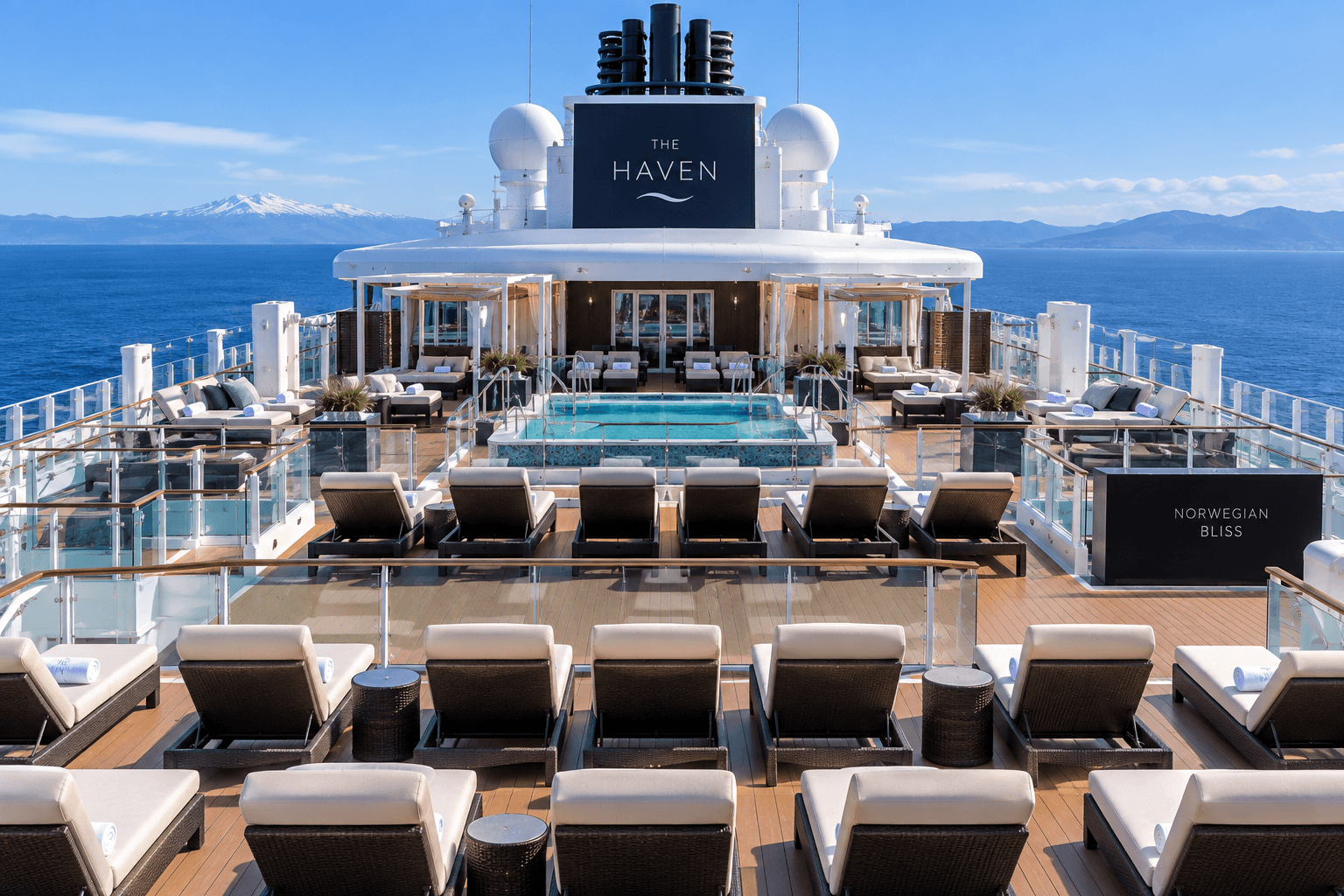 The Haven Sun Deck on Norwegian Bliss, the upper open-air level on deck 19 with loungers facing forward